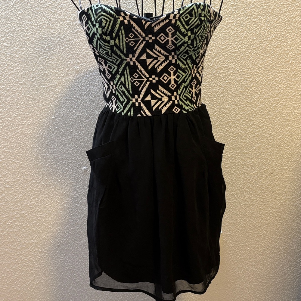 Retro Sugarlips Strapless Black Dress with Green and White Geometric Bodice